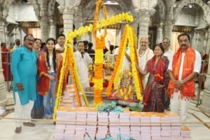 Book Weighing Ceremony Held at Shri Mahalaxmi Temple on the Occasion of Adhik Maas